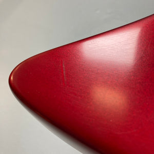 Guild USA X-79 Candy Apple Red guitar, close-up of its professionally refinished surface. Rare 1980s model with avant-garde design and 24-fret fingerboard.