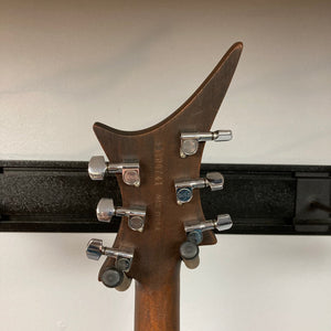 Guild USA X-79 Candy Apple Red guitar, close-up showing its distinctive, professionally refinished body and 24-fret fingerboard.