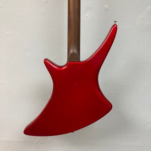 Guild USA X-79 Candy Apple Red guitar with brown neck, 24-fret fingerboard, and avant-garde body shape.