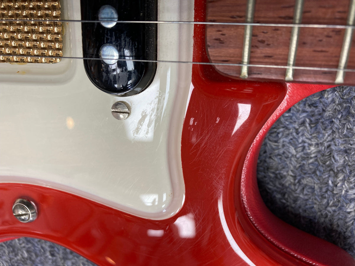 Hagstrom I vintage electric guitar close-up, showcasing its well-preserved condition, original flatwound strings, and slender neck design.