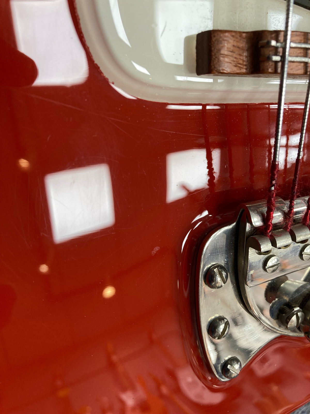 Hagstrom I vintage red electric guitar with original case, close-up showing pristine condition and authentic vintage features.