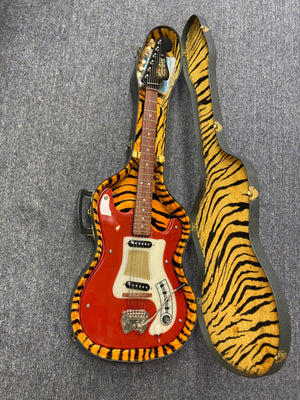 Hagstrom I Vintage Electric Guitar in red, placed in a tiger-print case, showcasing original flatwound strings and minimal wear, highlighting its pristine condition.