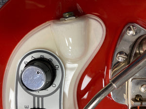 Hagstrom I Vintage Electric Guitar, red and white, close-up showing body, knobs, and strings, highlighting its pristine condition and original components.