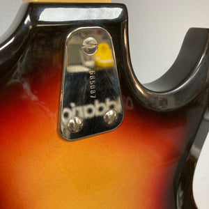 Hagstrom III Left Hand 1960s Sunburst Electric Guitar, close-up of the back showing screws and metal components.