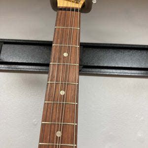 Hagstrom III Left Hand 1960s Sunburst Electric Guitar w/Case on display, showcasing its vintage-inspired neck and sunburst finish.