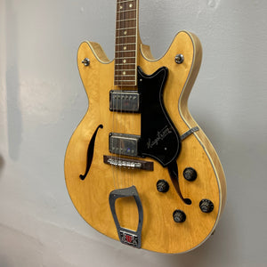 Hagstrom Viking 1968 Natural w/Case, close-up of guitar strings and volume knobs, showcasing its vintage design and craftsmanship.