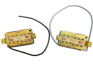 The TV Jones Powertron Neck and Bridge Pickup Set - Chrome (New Old Stock) delivers vintage Gretsch-inspired style and tone. These Filter’Tron-style humbuckers from TV Jones are shown with attached wires, labels, and flag stickers on a white background.