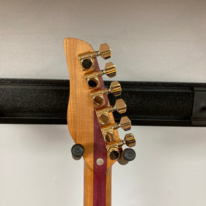 Jamstik Deluxe MIDI Blue Guitar w/Case, featuring gold knobs on the neck, 24 frets, and advanced MIDI capabilities.