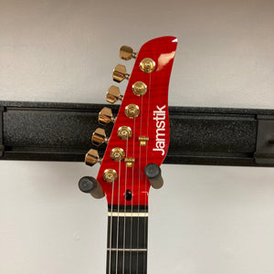 Jamstik Deluxe MIDI Red Black Guitar w/Case featuring gold knobs, HH pickup configuration, and advanced MIDI capabilities for professional and hobbyist musicians.