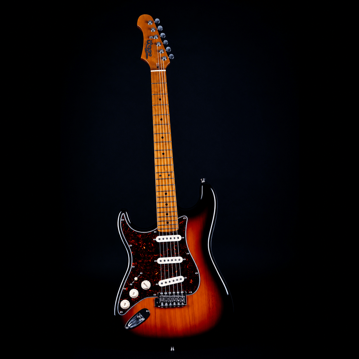The Jet JS-300 SB LH Left Handed Electric Guitar by Jet features a sunburst finish, a maple neck, an SSS configuration with three single-coil pickups, and a dark pickguard, displayed upright against a black background.