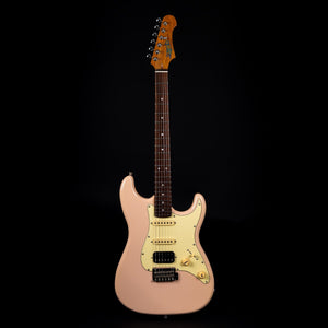 Jet JS-400 pink electric guitar, showcasing its Canadian roasted maple neck and HSS pickup configuration, ideal for versatile playstyles.