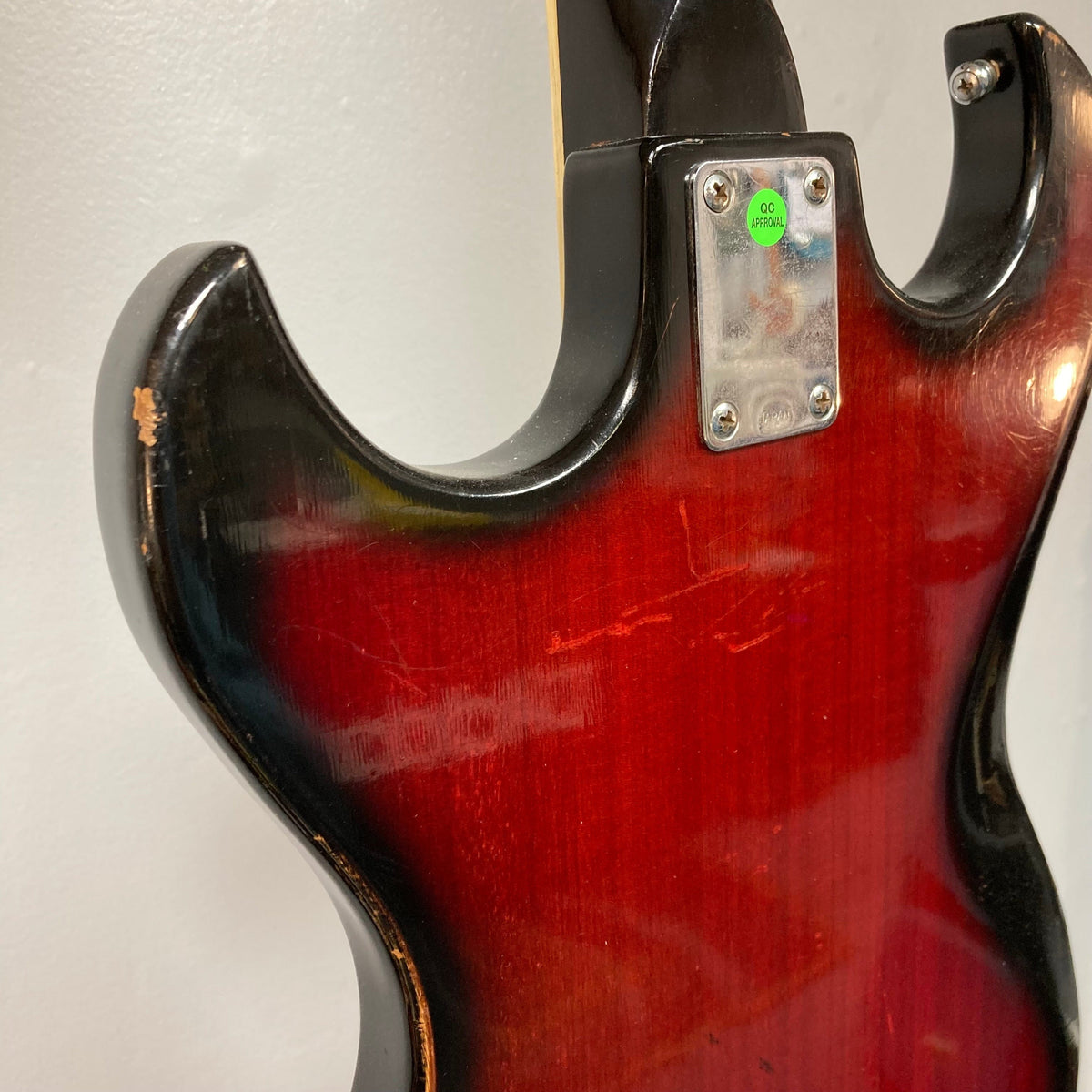 Close-up of the Kawai Vintage 1960s Kawai Teisco Japan Hound Dog Reburst guitar, highlighting its intricate craftsmanship and unique Hound Dog burst finish.