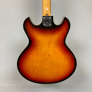 Close-up of the Kingston Semi-Hollowbody 1960s Vintage Burst guitar, highlighting its semi-hollow design and vintage aesthetic.