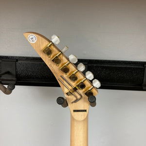 Kramer Jersey Star guitar neck with gold knobs, white buttons, and star inlays.