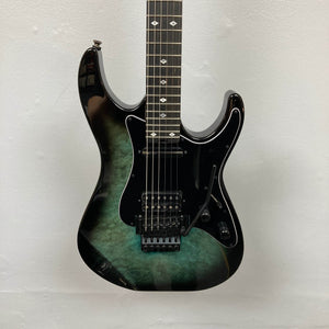 Electric guitar with a black and green gradient on a light gray background