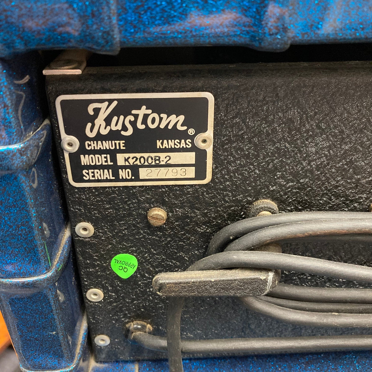 Close-up of the Kustom K200-B2 Blue Head and Cabinet Amp showcasing its control panel, cables, and vintage-inspired design.