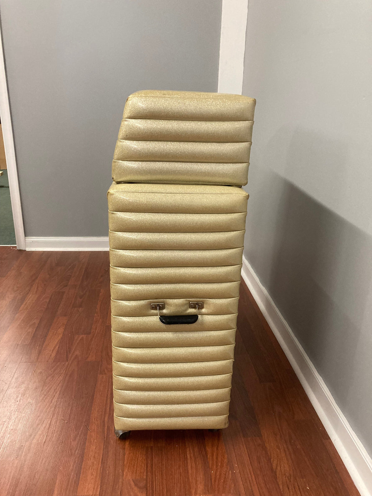 Kustom K250-4 Amp and Speaker Cabinet with gold sparkle tuck and roll design displayed on a wooden floor.