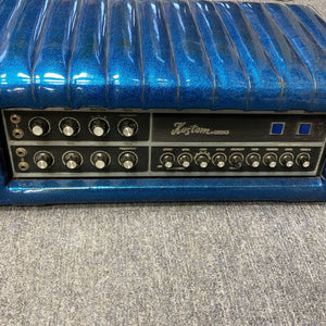 Kustom K250 Amp Head with blue sparkle design, featuring buttons and knobs for versatile sound.