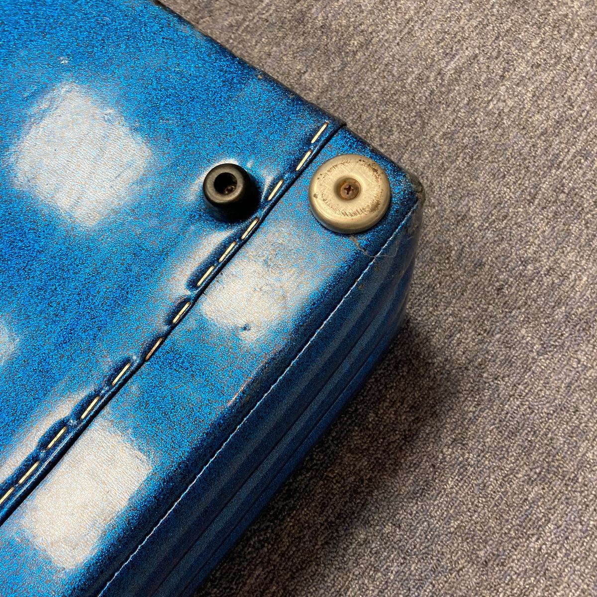 Kustom K250 Amp Head with blue sparkle tuck and roll design, showcasing a vintage style with visible screws, perfect for music enthusiasts.