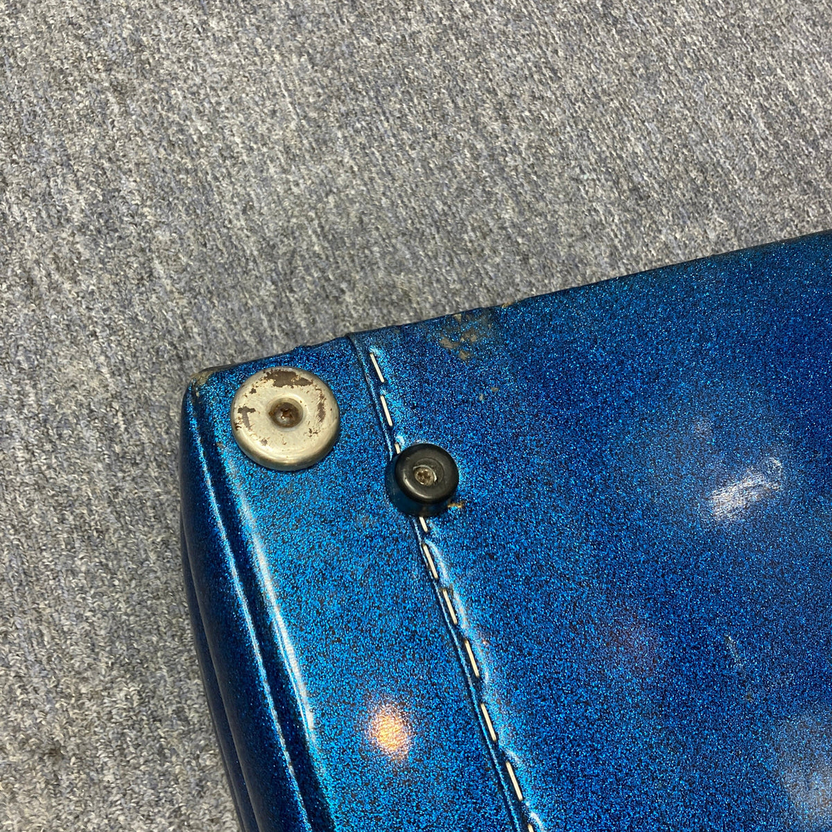 Kustom K250 Amp Head with blue sparkle tuck and roll design, featuring a white screw, known for its vintage style and solid performance.