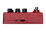 The Line 6 POD Express | Guitar by Line 6 is a red effects processor featuring three black knobs, a silver input jack, a small round button, and a rectangular port on its front panel, set against a white background.