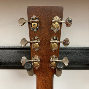 Martin D-15M guitar close-up showing solid mahogany construction and detailed craftsmanship.