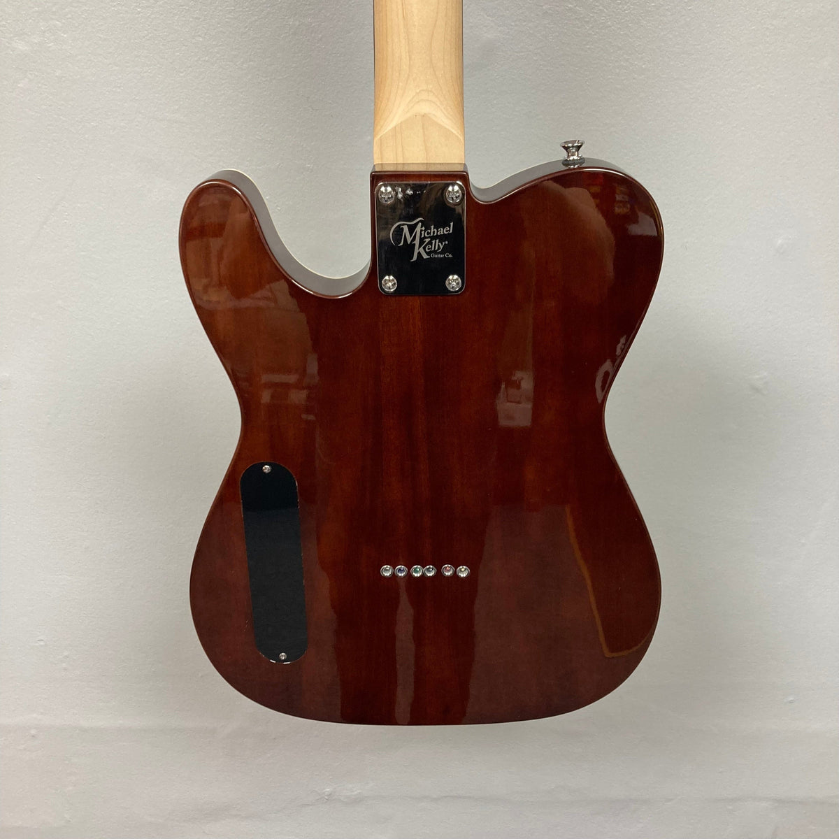 Michael Kelly 58 Tele Thinline Flame Maple Prototype Demo guitar with humbucker pickups and a spalted maple top.