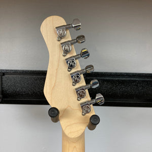Close-up of the Michael Kelly 58 Tele Thinline Flame Maple Prototype Demo guitar, highlighting its Rockfield® SWC humbucker pickups and chambered mahogany body.