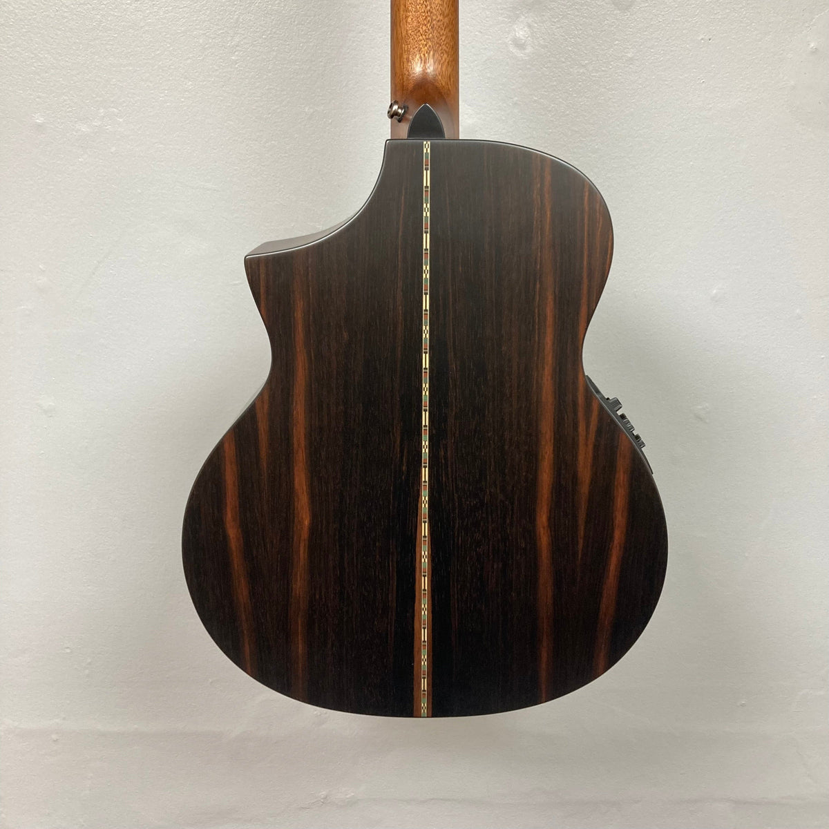 Close-up of the Michael Kelly Dragonfly 4 Slim Forte Port 3/4 Bass Prototype, highlighting intricate Dragonfly inlay and ergonomic design.