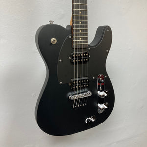 Michael Kelly Hybrid 55T Black Satin Blem electric guitar with silver knobs, showcasing Rockfield® humbuckers and Fishman® Powerbridge, perfect for diverse electric and acoustic tones.