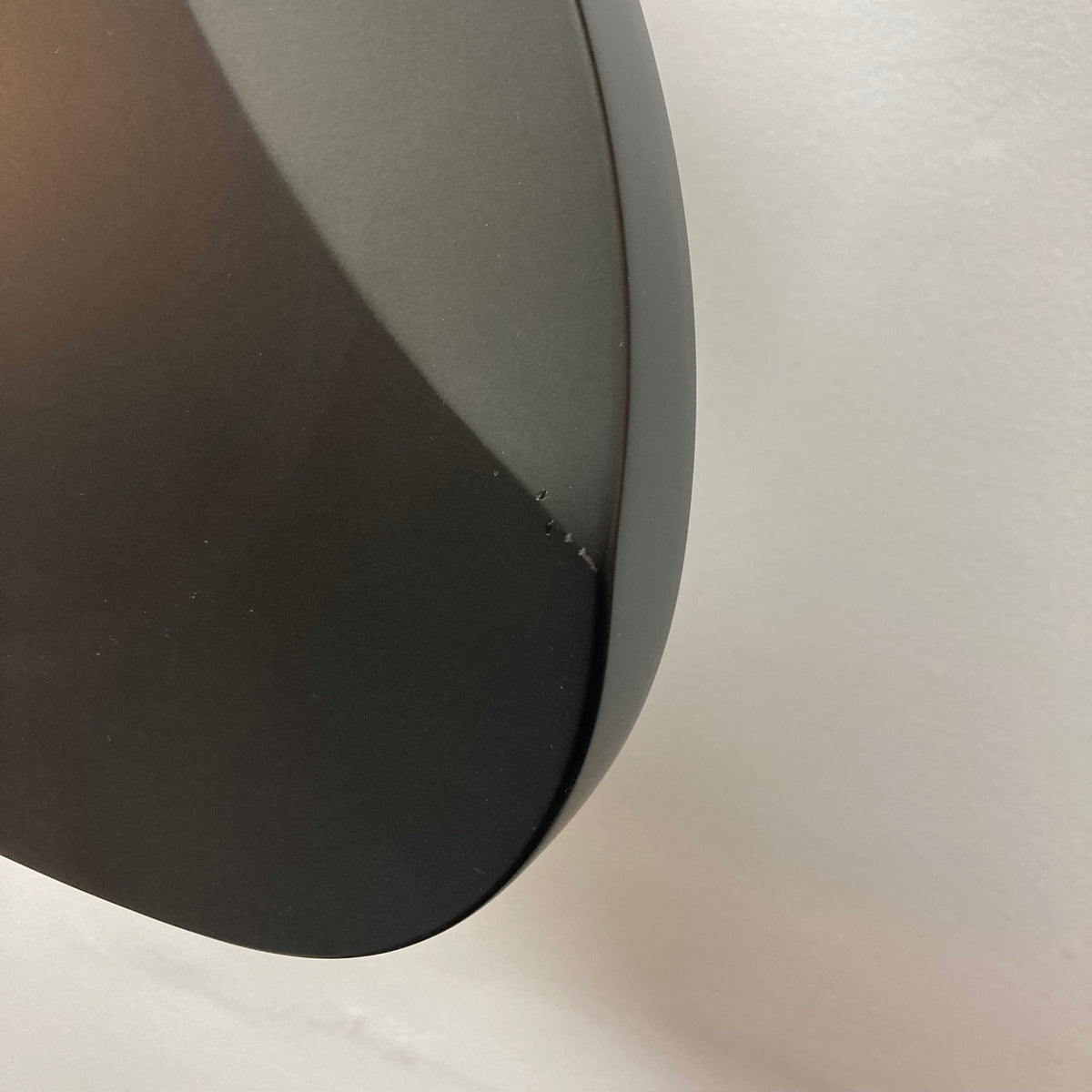 Close-up of the Michael Kelly Hybrid 55T Black Satin Blem, highlighting its satin black finish and a small blemish on the backside.
