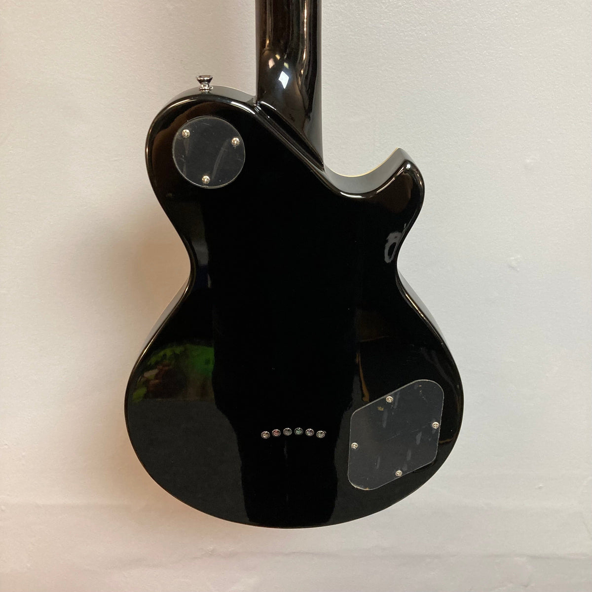 Michael Kelly Patriot Decree Lefty Black Blem electric guitar with chrome hardware, Tune-O-Matic bridge, and Rockfield PAF pickups.