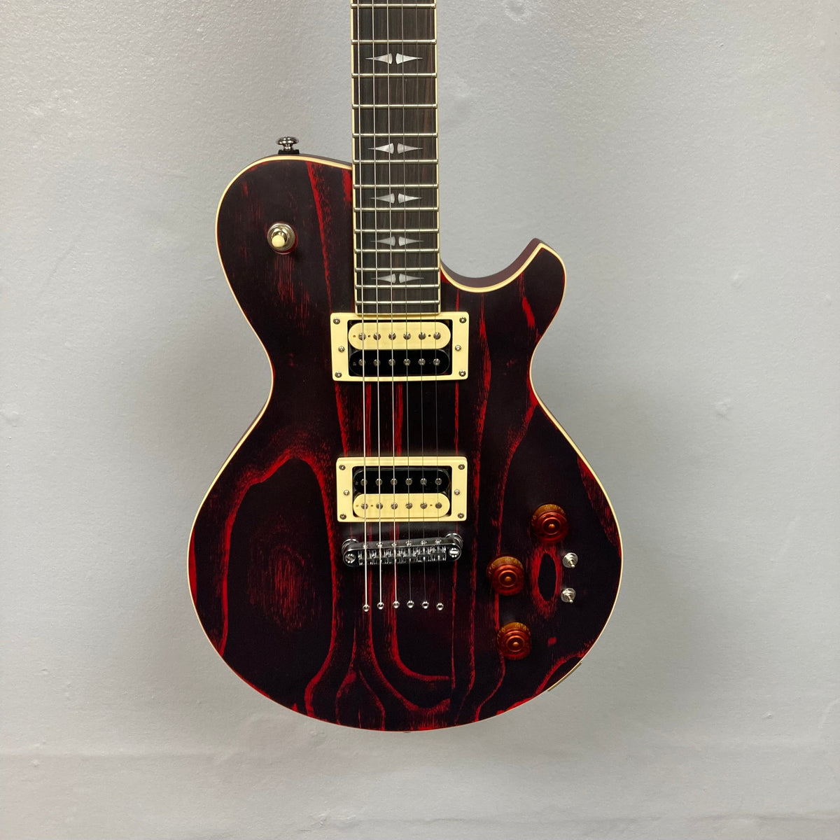 Michael Kelly Patriot Decree Open Pore Slim Body Cherry Red close-up, showcasing strings and neck with rich detailing.