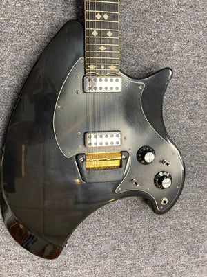 Ovation Deacon 12-String Electric Guitar in black, showcasing its solid body and distinctive features, including close-ups of strings and knobs, on a carpet background.