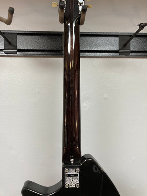 Ovation Deacon 12-String Electric Guitar, black, showcasing a solid body with visible screws and minor headstock chip.