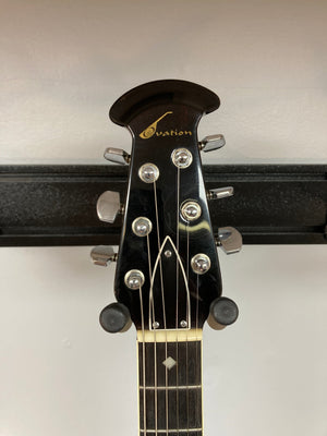 Ovation Deacon 1973-1975 Sunburst Electric Guitar headstock with tuning pegs and minor wear visible.