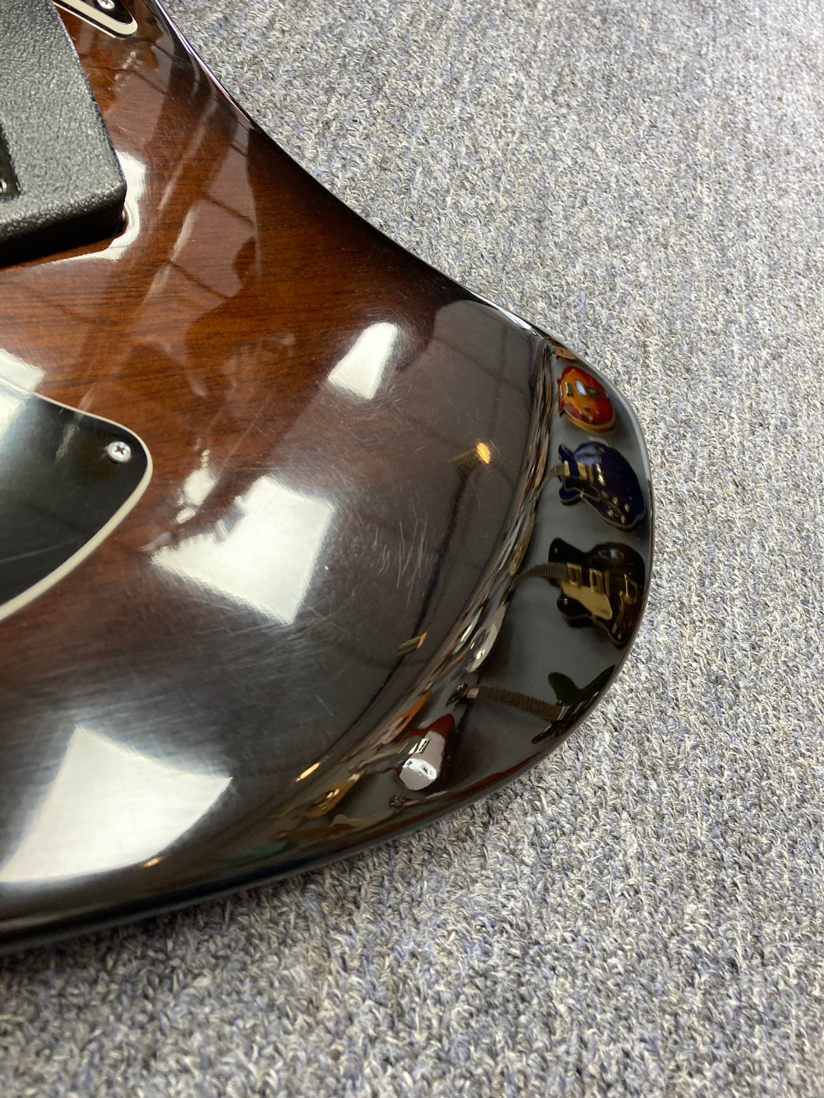 Ovation Deacon 1973-1975 Sunburst Electric Guitar close-up showing its vintage sunburst finish and well-preserved condition with minor wear.