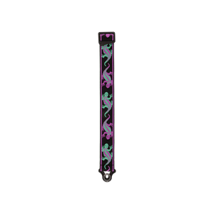 The Planet Waves Auto Lock Guitar Strap in green and purple lizards pattern features a sturdy design reminiscent of a stylish keychain strap, finished with a durable metal ring at the end.