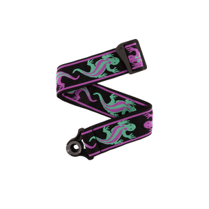 The Planet Waves Auto Lock Guitar Strap features green and purple lizard designs on a black and purple strap, with a plastic buckle and eyelet—ideal for fans of unique guitar accessories.