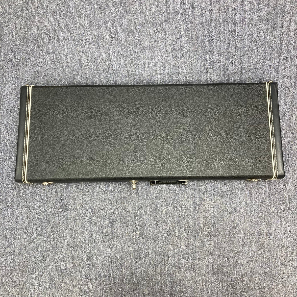 PRS 1996 Gold Top guitar in its original black hard case with silver handles.