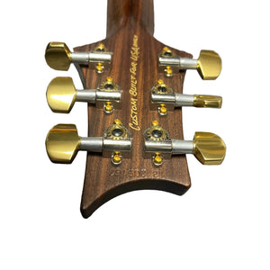 Close-up of a PRS P22 Artisan Piezo Green Fade 2013 headstock with gold tuners and "Custom Built for USAAM" engraving, showcasing signature humbuckers and piezo versatility. Includes Brazilian Rosewood fingerboard and case.