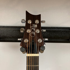 PRS SE A50E Charcoal Burst guitar close-up, showcasing headstock with knobs and strings, and Fishman GT1 pickup system for live performances.