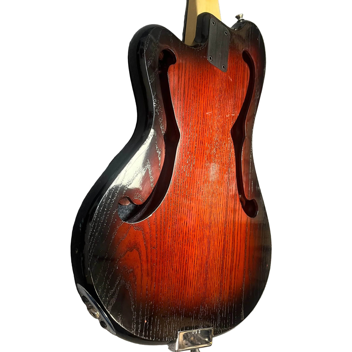 A close-up of the back of a Rare Ampeg AEB-2 Scroll Top Bass Serial #13, a prototype-era Bruce Johnson build, featuring a sunburst finish and visible wood grain, inspired by the classic Ampeg Scroll Bass design.