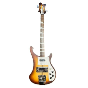 A collector-owned Rickenbacker 4003 Bass 2022 in Autumnglo with checkerboard binding, four strings, white pickguard, two pickups, and control knobs is displayed against a white background.