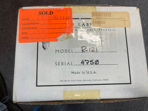 White box featuring a product label with model R121, serial 4750, and an orange "SOLD" sticker containing handwritten sales and customer information. This packaging likely contains a pre-owned Royer Labs R-121 Ribbon Microphone (in excellent condition), a premium studio ribbon microphone renowned for both instrument and guitar amplifier recording.