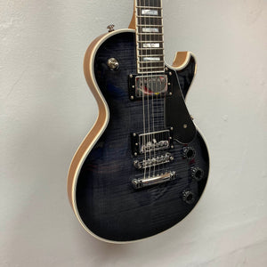 This Schecter Solo-II Custom Trans Black Burst w/Case Used by Schecter features chrome hardware, a black pickguard, white body binding, and USA Pasadena pickups, shown against a plain light-colored wall.