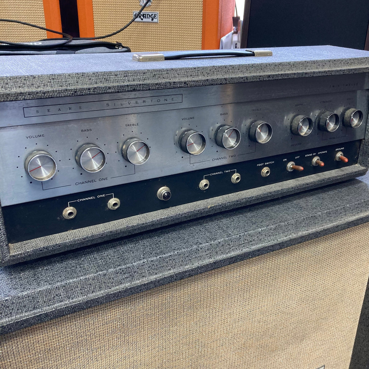 Silvertone Model 1484 Twin Twelve 60-Watt 2x12 Guitar Amp with close-up of control dials for versatile tone shaping and vintage sound.