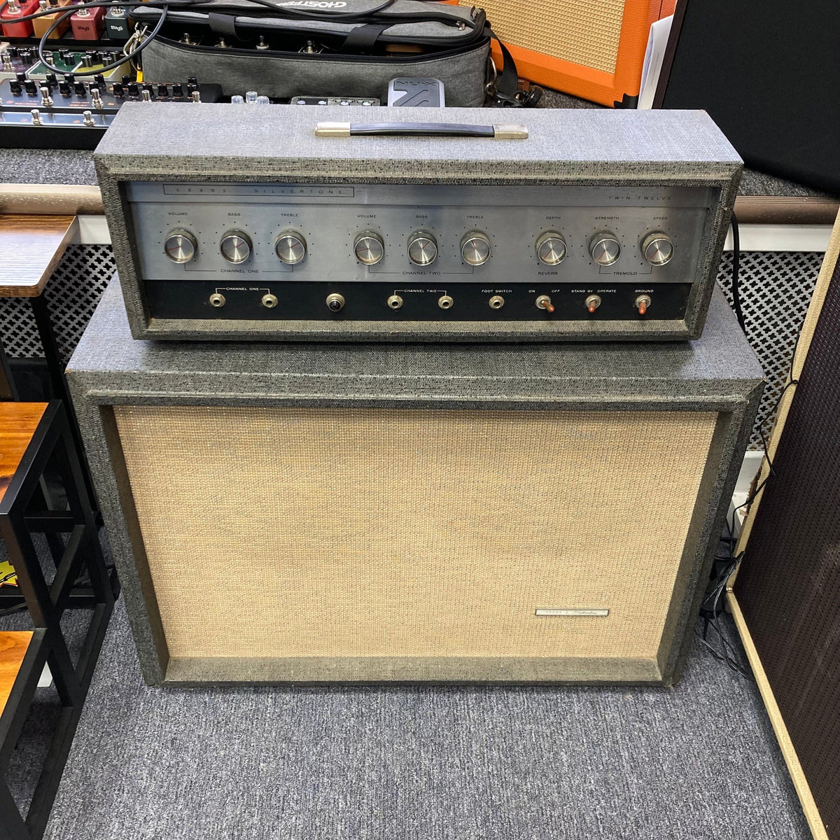 Silvertone Model 1484 Twin Twelve 60-Watt 2x12 Guitar Amp with speaker and amplifier, showcasing vintage design and powerful performance.