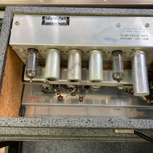 Silvertone Model 1484 Twin Twelve 60-Watt 2x12 Guitar Amp with tubes, wires, and metal components showcasing vintage design and powerful performance.