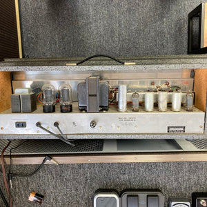 Silvertone Model 1484 Twin Twelve 60-Watt 2x12 Guitar Amp with multiple tubes and wires, featuring vintage design and robust performance.